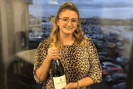 Graduate Recruitment Consultant Hannah Abraham celebrating her first successful placement 